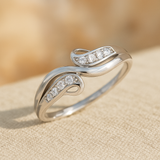 Elegant Wave-Design Diamond CZ Ring in Sterling Silver Finish